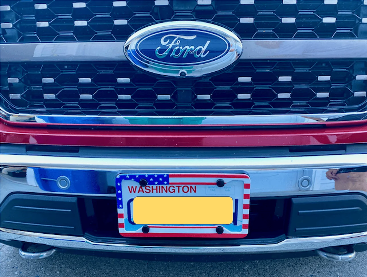 Ford F-150 How about getting that front license plate bracket off? 1625535201129