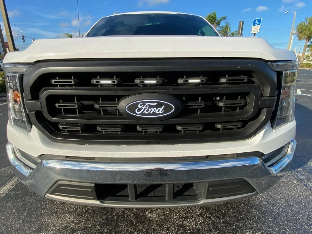 Ford F-150 Picking off driving light power under the hood 1679657814632