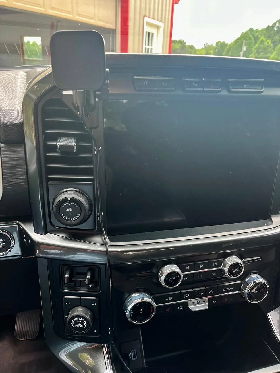 Ford F-150 A clean mobile phone mount installation with minimum wires showing F150 2023 Platinum 1756603611560-xk