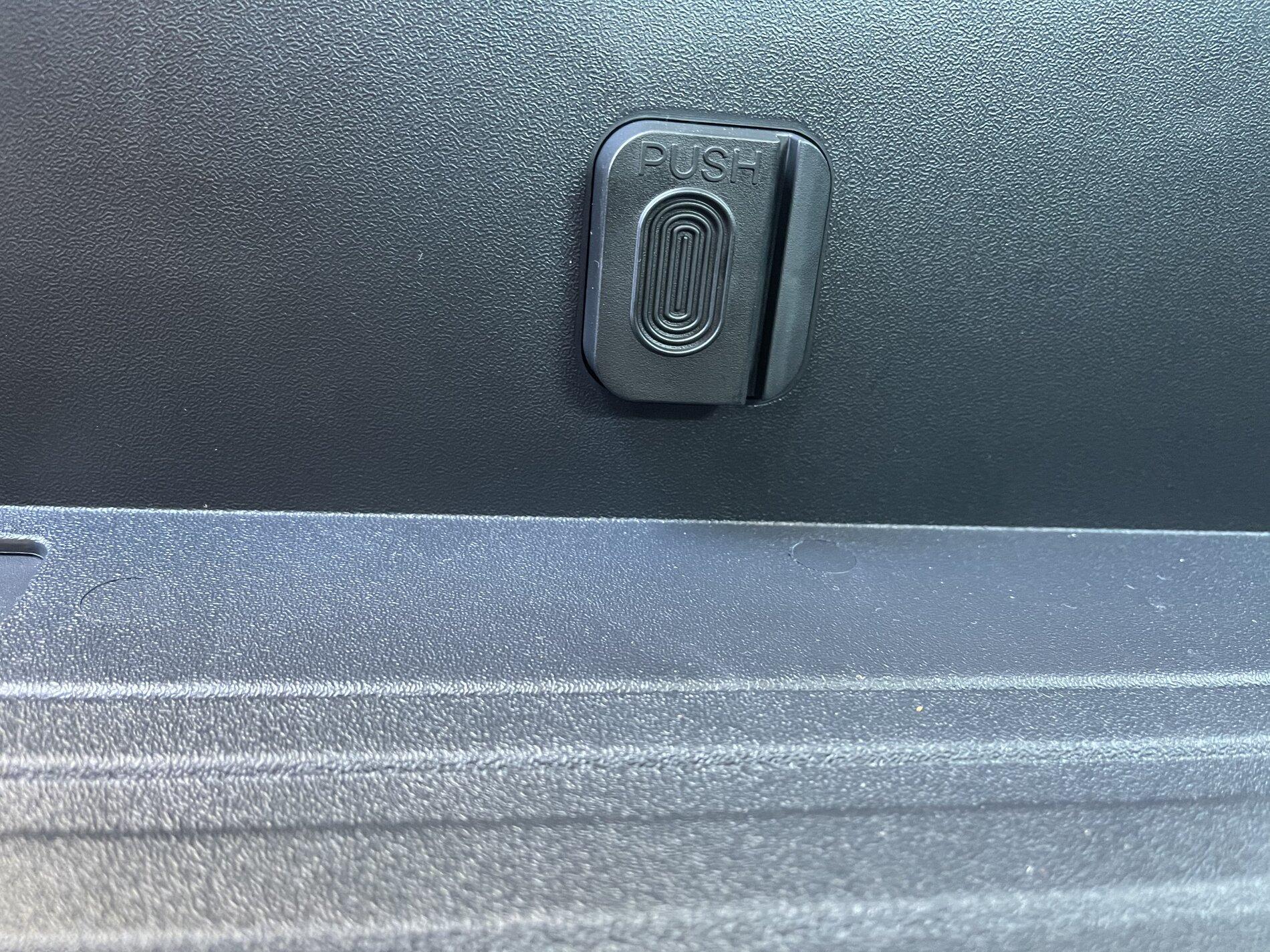 Ford F-150 Button on lockable storage 1CCF8444-D054-48A1-B7AD-16C8F419BADC