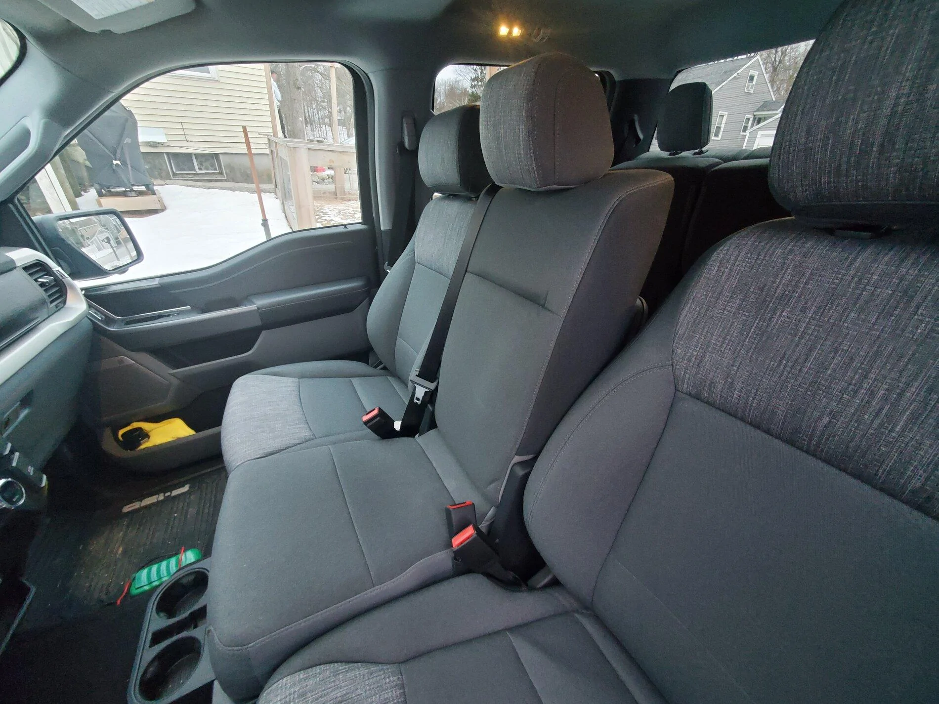 Ford F-150 40/20/40 seating + center work surface --- be aware the part you rest your arm on does not open. 20210201_072357