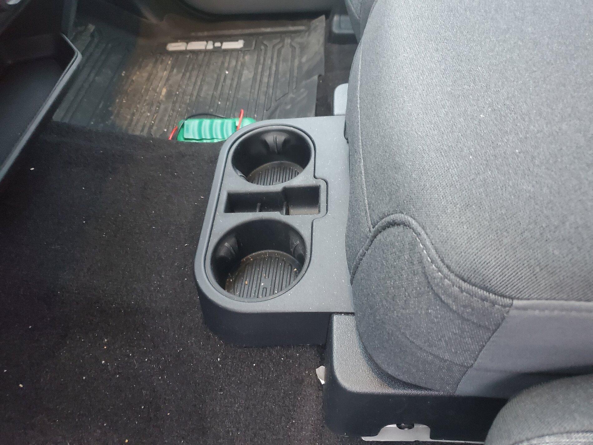 Ford F-150 40/20/40 seating + center work surface --- be aware the part you rest your arm on does not open. 20210201_072542