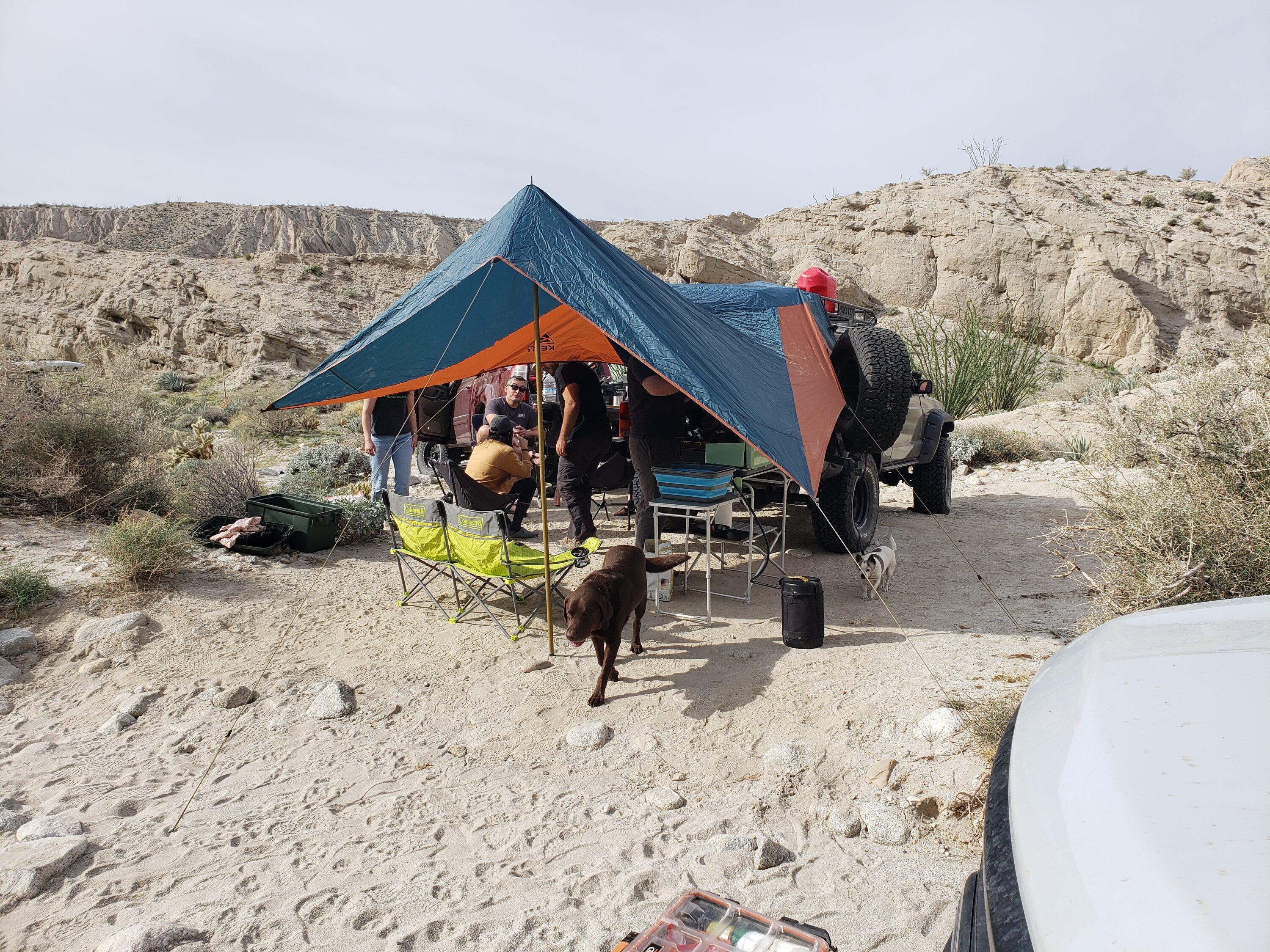 Ford F-150 Rain solutions ? I'm using a 12x10 canopy off the tailgate cooking area. I like Kelty products too. 20240225_090157
