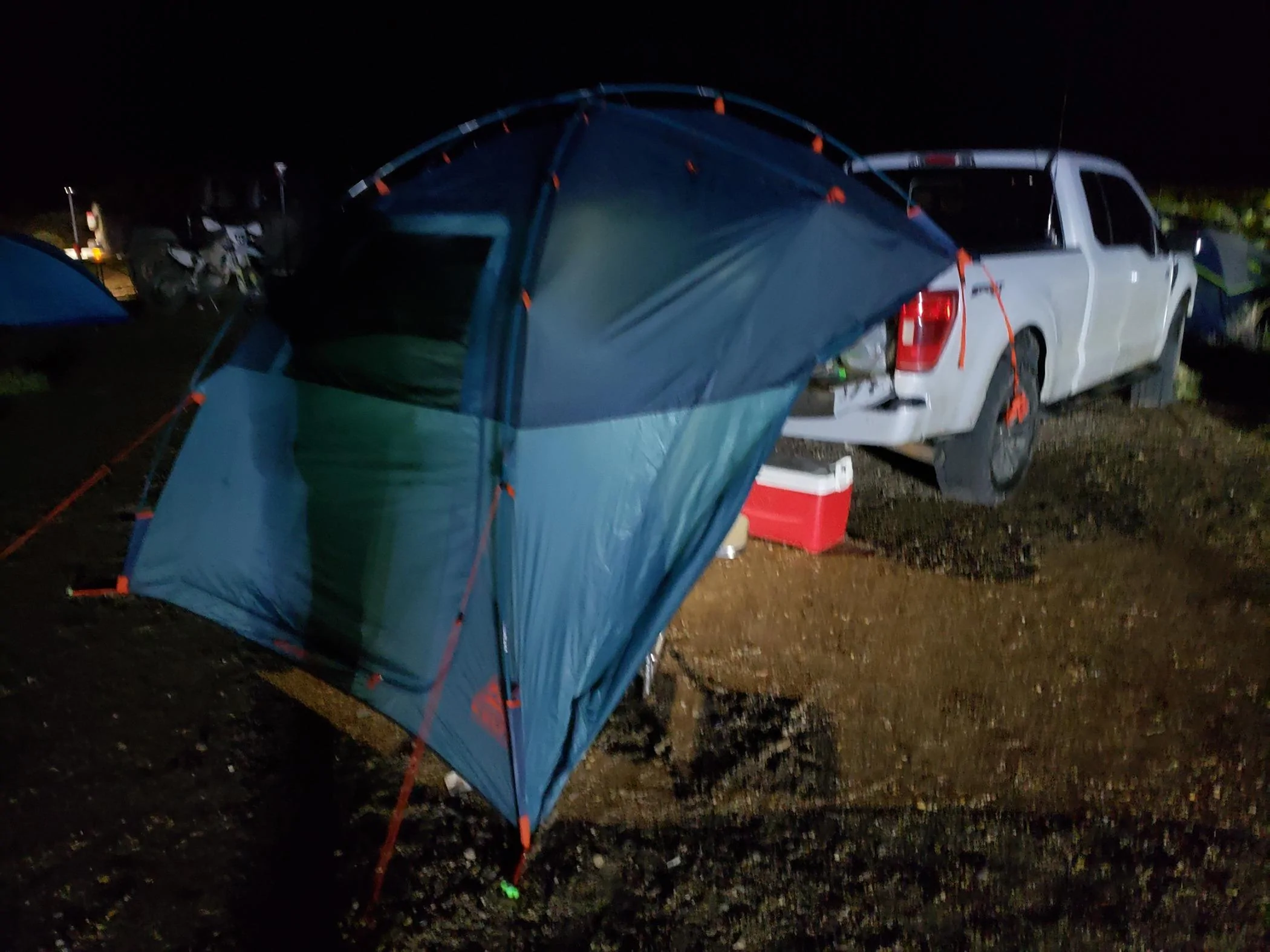 Ford F-150 Rain solutions ? I'm using a 12x10 canopy off the tailgate cooking area. I like Kelty products too. 20240316_213620
