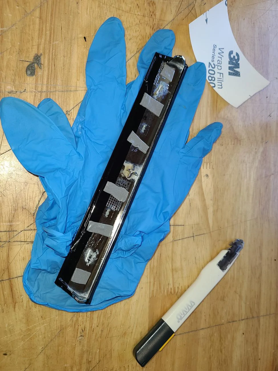 Ford F-150 Removing chrome tailgate handle blank 20240811_143852