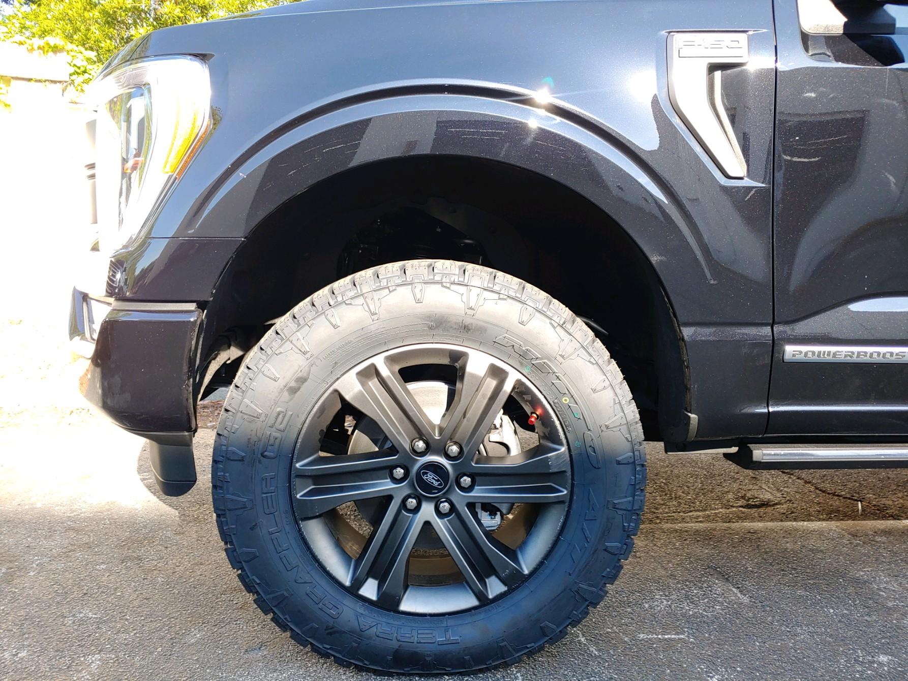 Ford F-150 275/65/20 Nitto Ridge Grappler VS 295/60/20 Terra Grappler side by side visual comparison. 2605