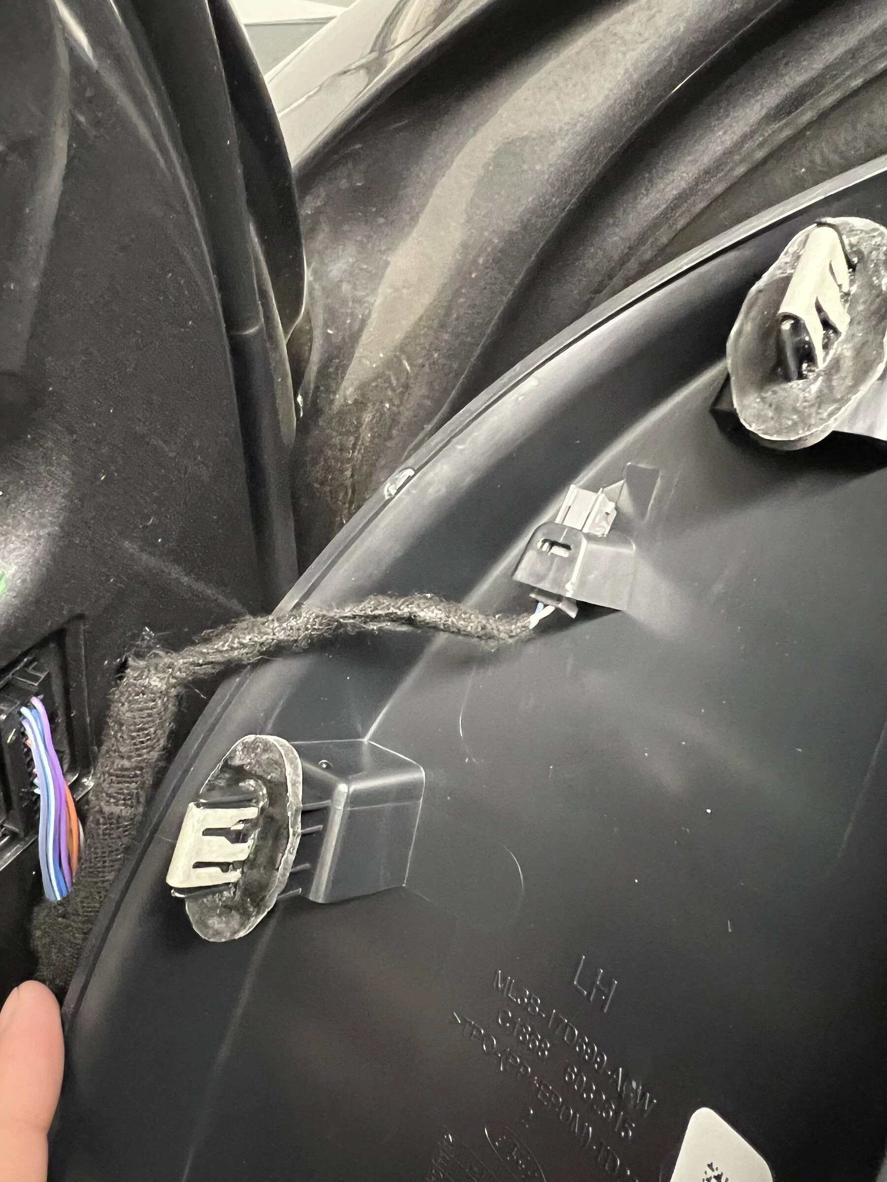 Ford F-150 Unused Plug Behind Trim 42C34FFB-B4A4-4FA2-B02E-69539257C16D