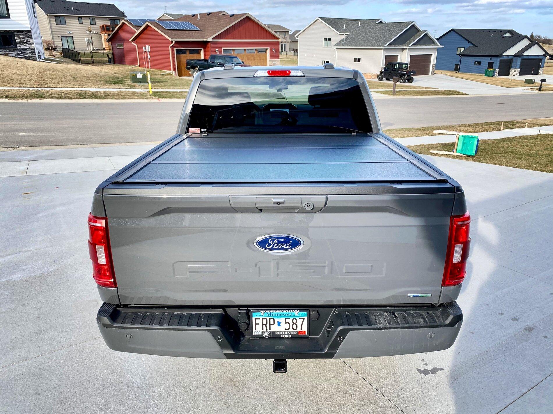 Ford F-150 Finally got my bed setup: bed liner, tonneau cover, and bed divider. 609EDD49-A87F-4D6D-9525-C24B0264663D
