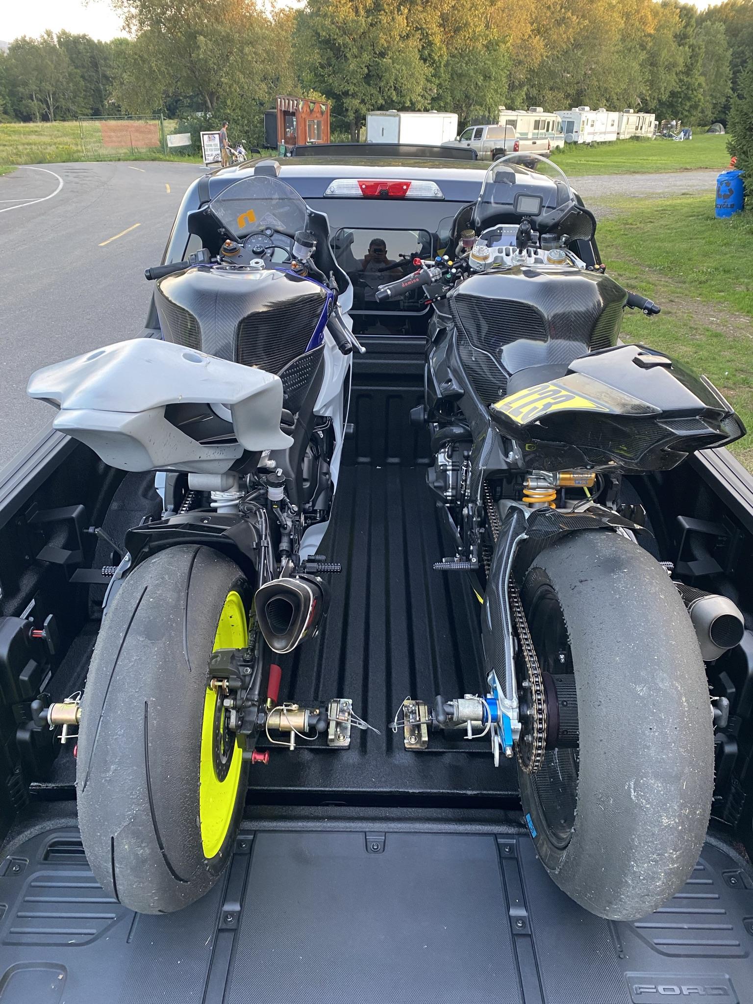 Ford F-150 hauling motorcycles in bed B46F26C0-0D97-4B26-B74F-3481DC868284