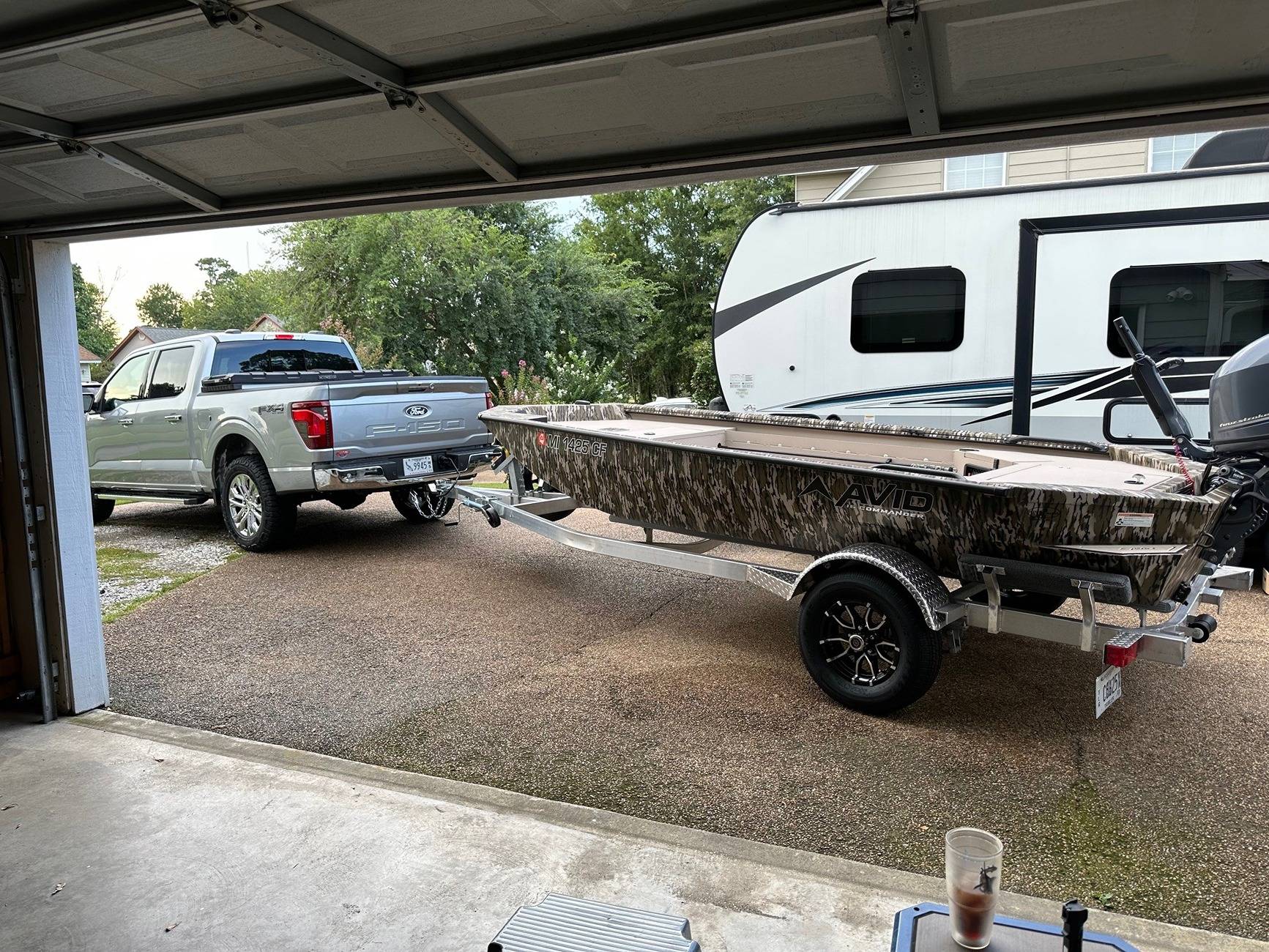 Ford F-150 What’s in Your Garage (Besides Your F-150)? Let's Share!🚗🛠️ boat 1