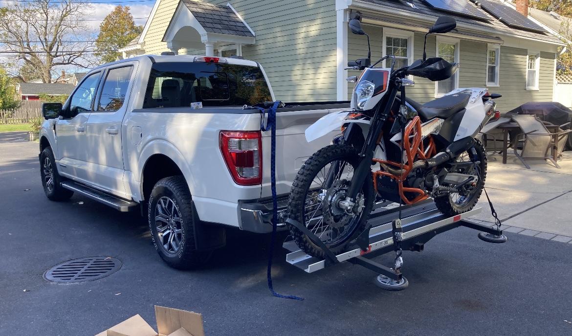 Ford F-150 hauling motorcycles in bed CB18F4F7-DA6B-42A3-935B-89089119CA27