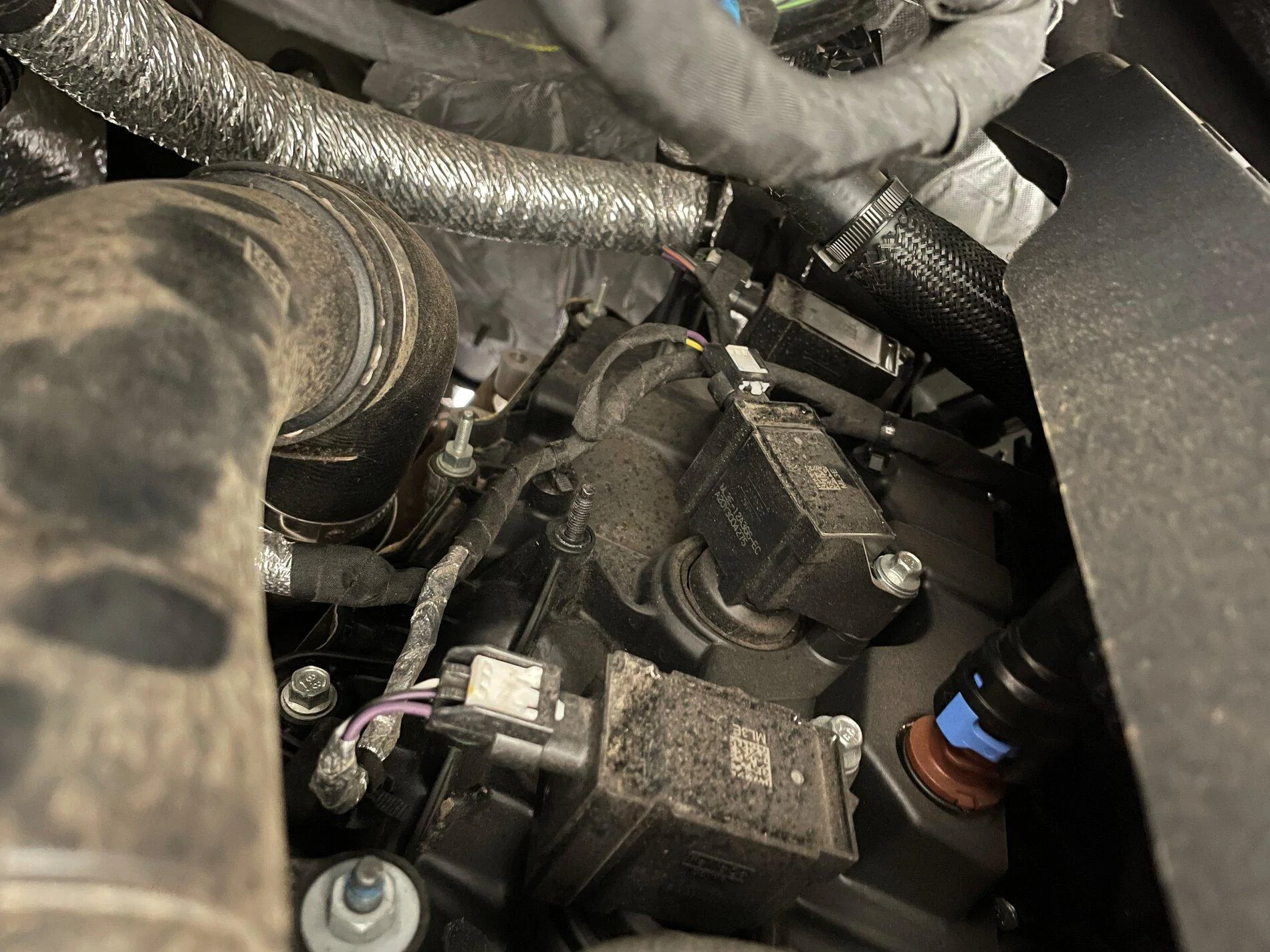 Ford F-150 Under the Hood, is this normal on the 21's? coil