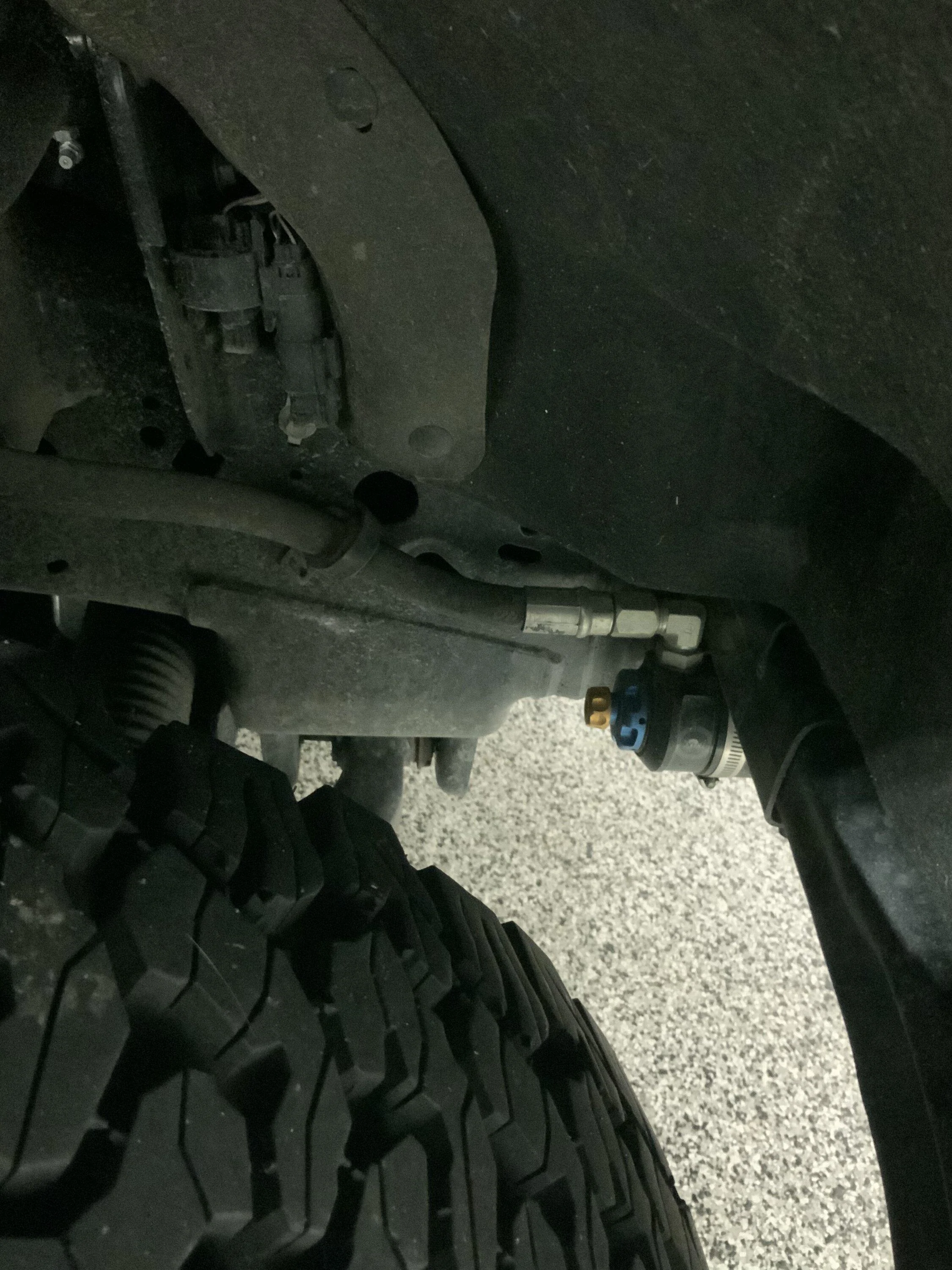 Ford F-150 Tire clearance remote reservoir placement D4667265-5BD3-408F-9FA9-2583D362864B