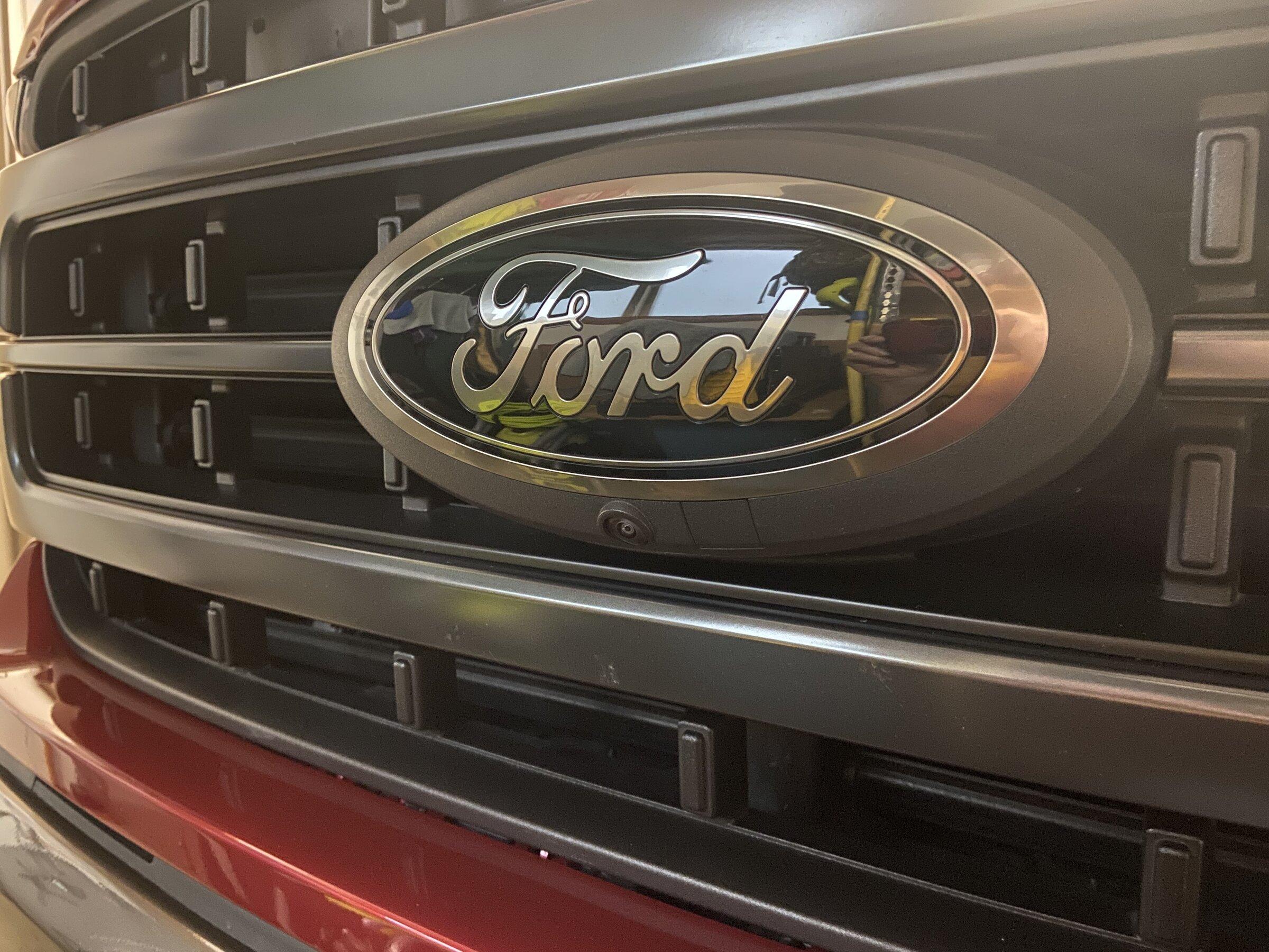 Ford F-150 Custom painted emblem on Rapid Red D7D3F335-5DF6-4261-8AD8-BD61138687F3