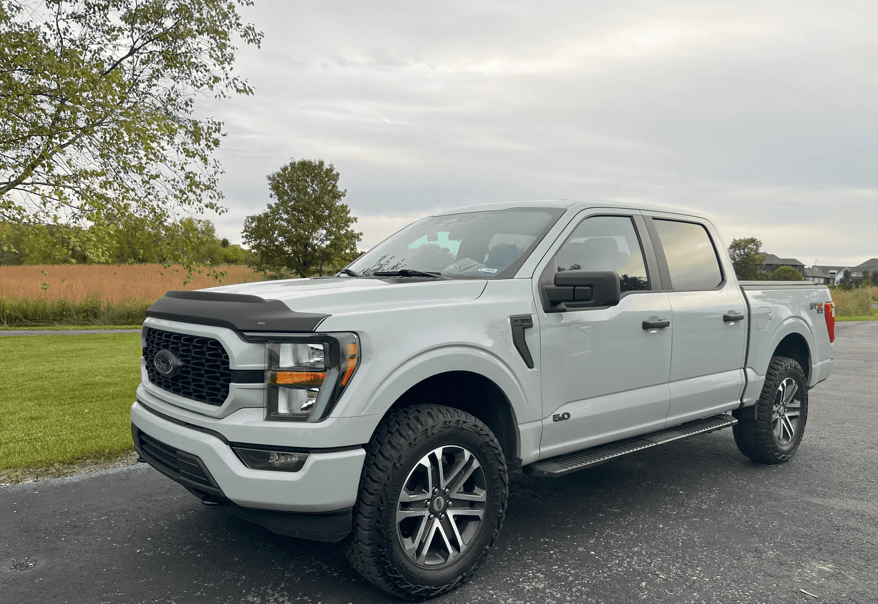 Ford F-150 275/65r20 Mickey T's Baja Boss AT f150-front-corner