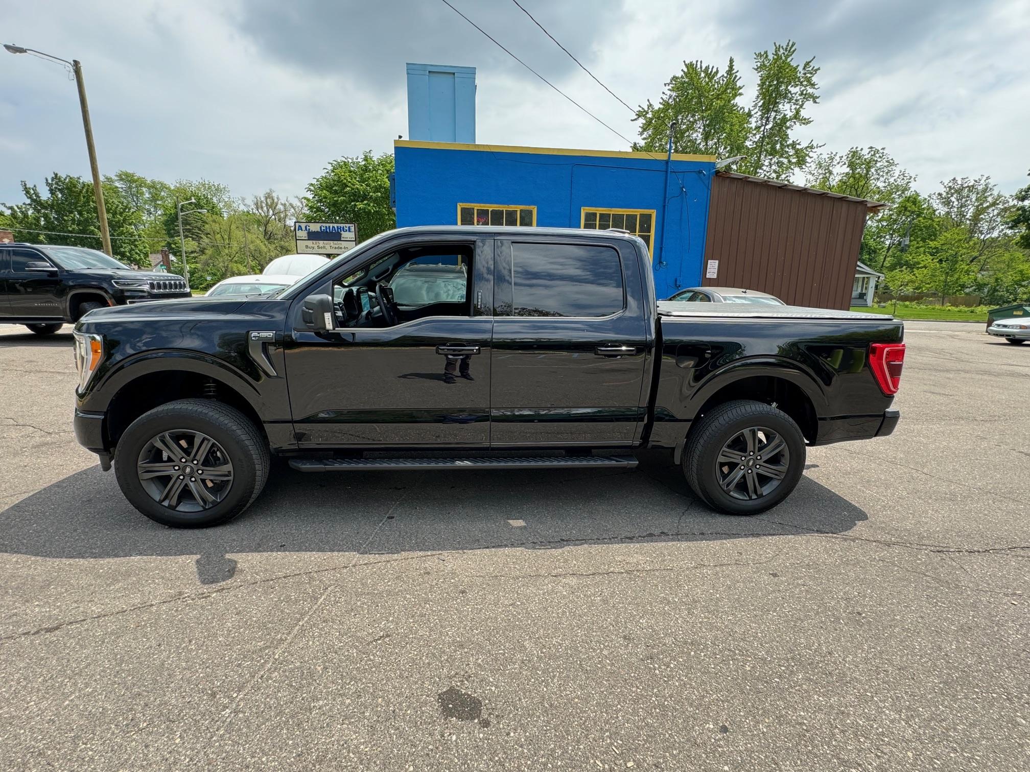 Ford F-150 Eibach Pro-Truck Stage 2R Coilover Level Kit installed on 2023 F-150 f150 post level at sho