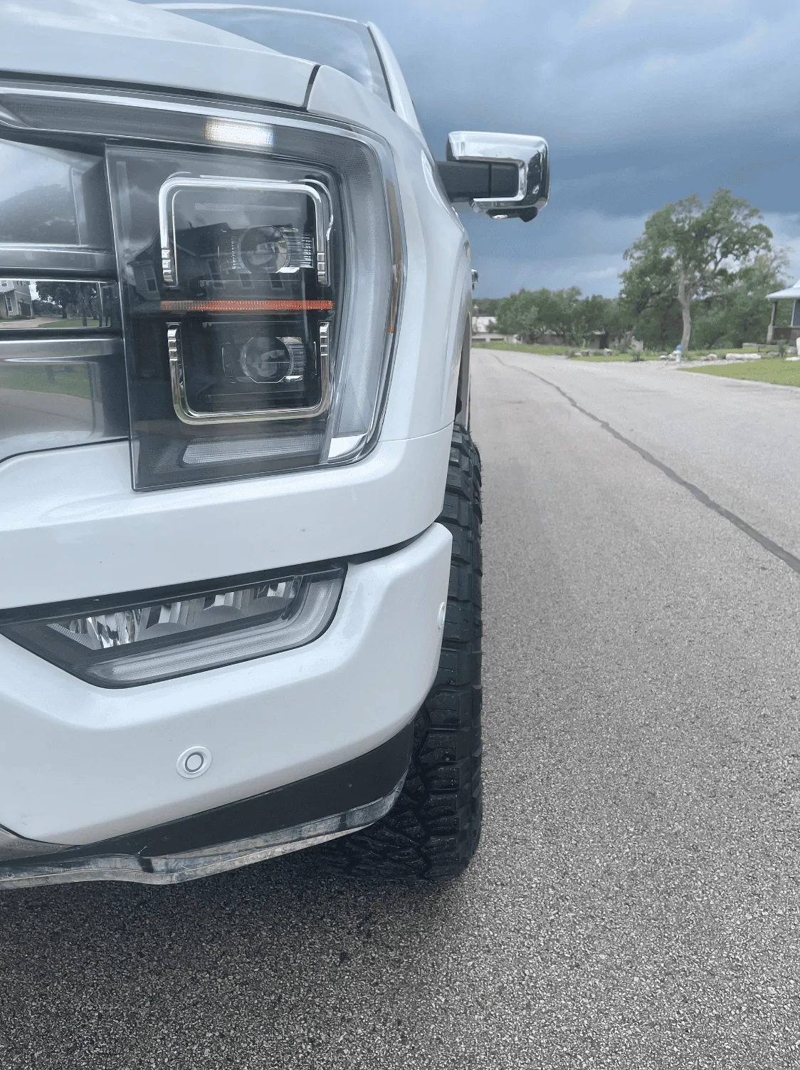 Ford F-150 2.5 King Coilover Reservoir and 295/70R18 Tires on 2021 FX4 Platinum front pok