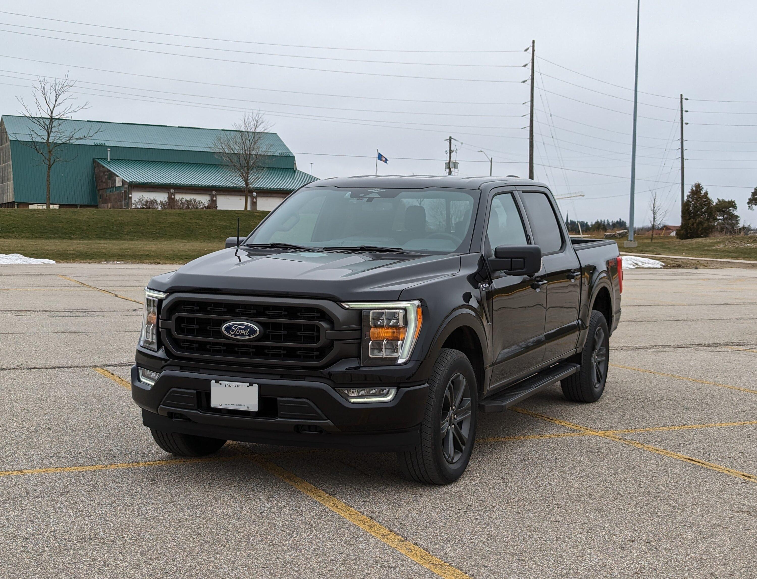 Ford F-150 The most generic 14th generation F-150... plus anniversary decals! Front View