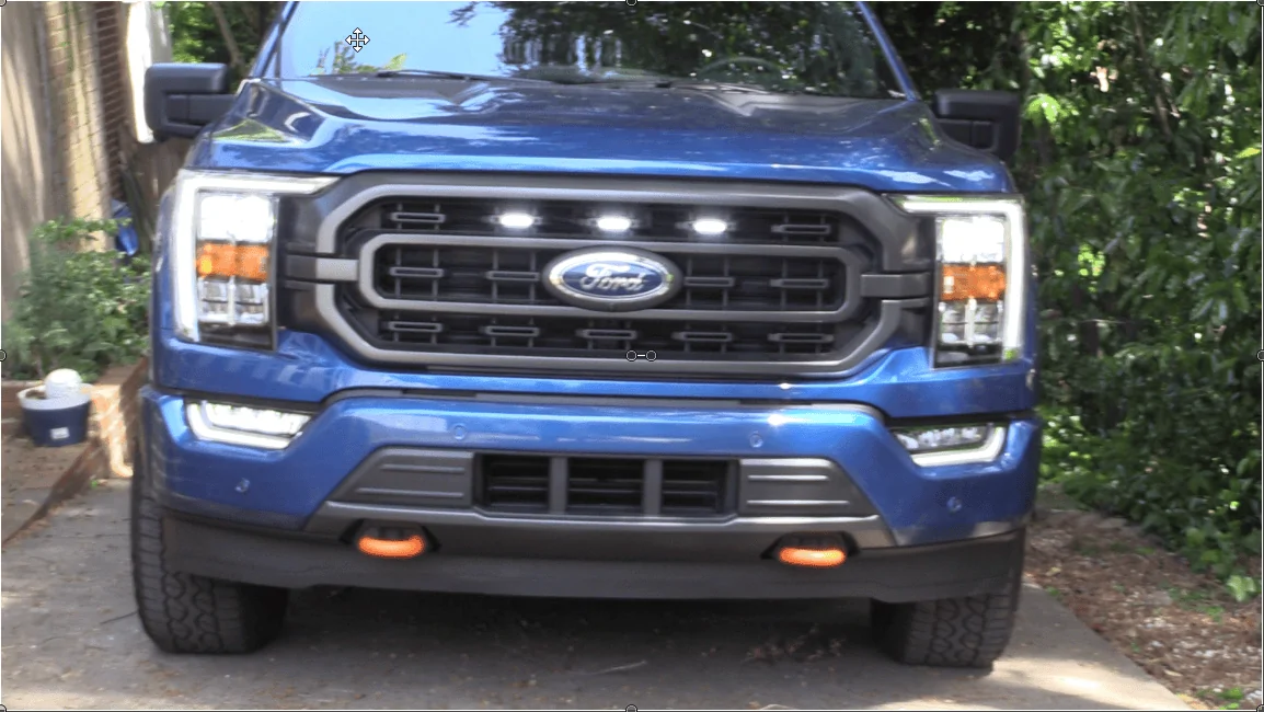 Ford F-150 Picking off driving light power under the hood grill