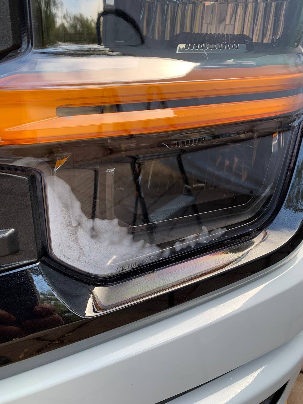 Ford F-150 2024 Lariat water in headlights HL1