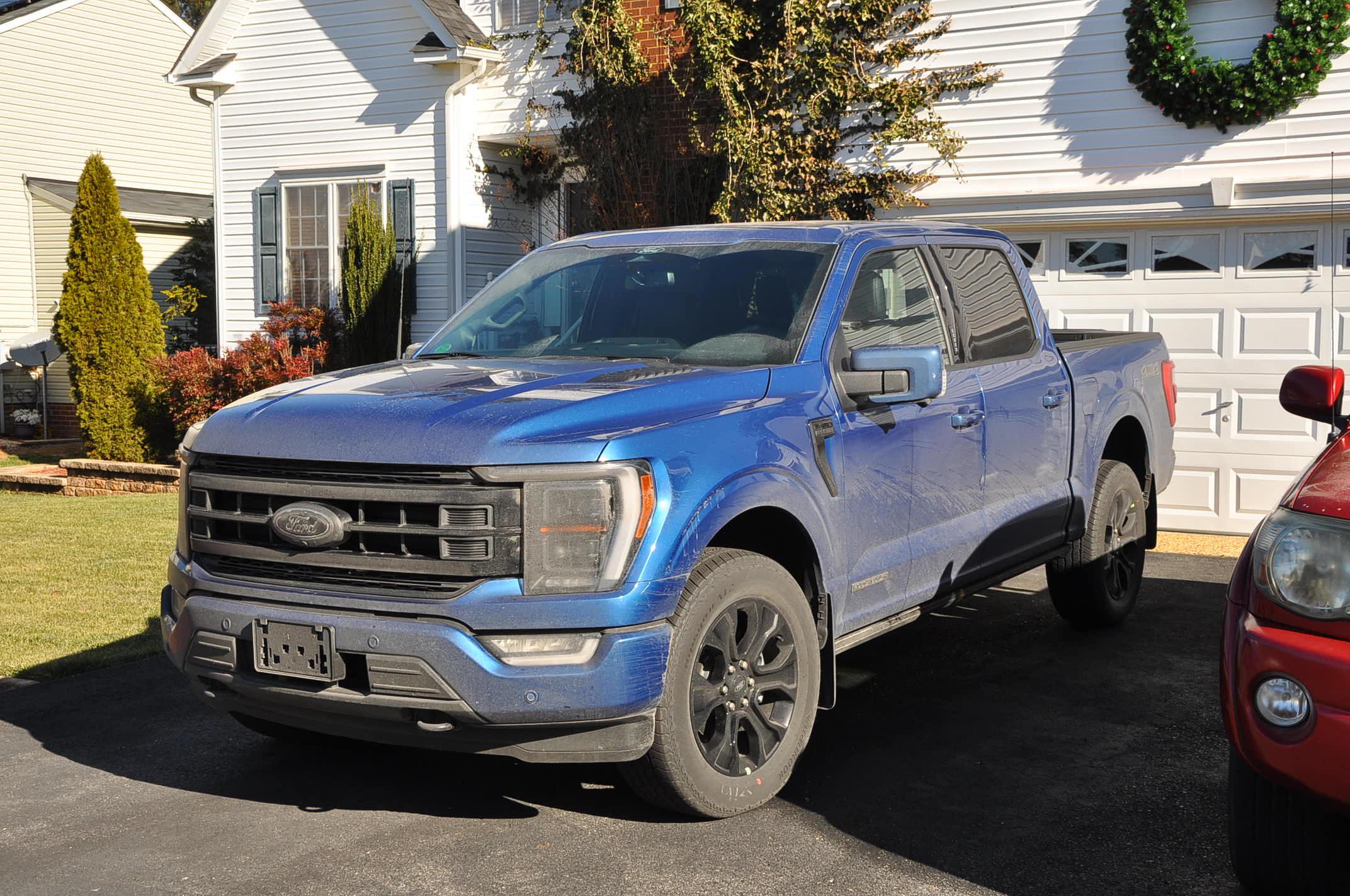 Ford F-150 Snow buildup on LED headlights Home.JPG