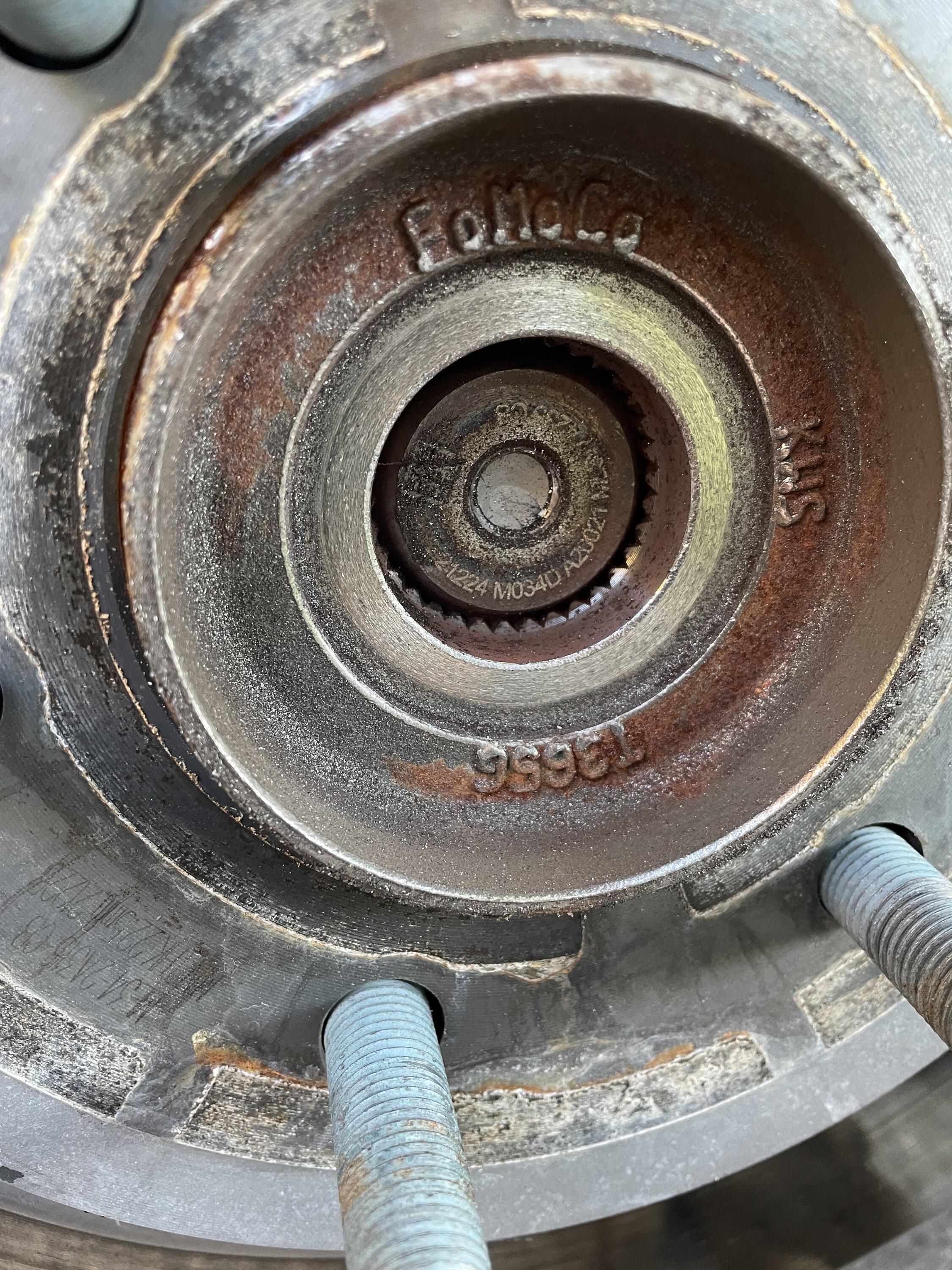 Ford F-150 Metallic squeal under braking, sheered axle bolt? IMG_0245.JPG