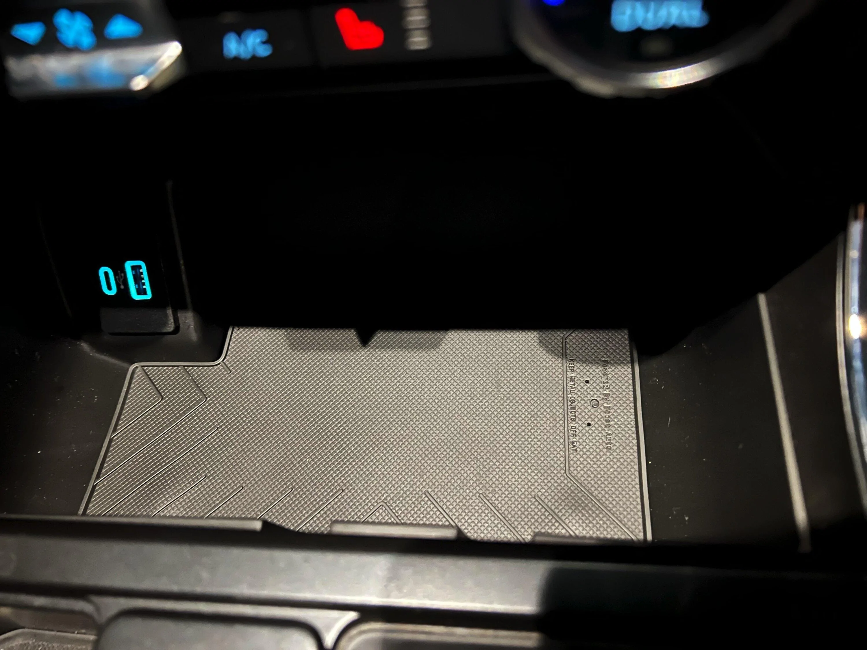Ford F-150 Installed Boost Auto Qi Charging Pad in center console tray IMG_0474