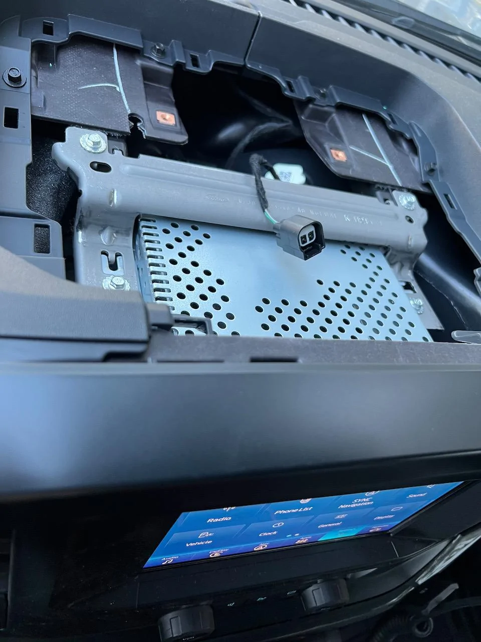 Ford F-150 Found a plug under center dashboard tray IMG_0871