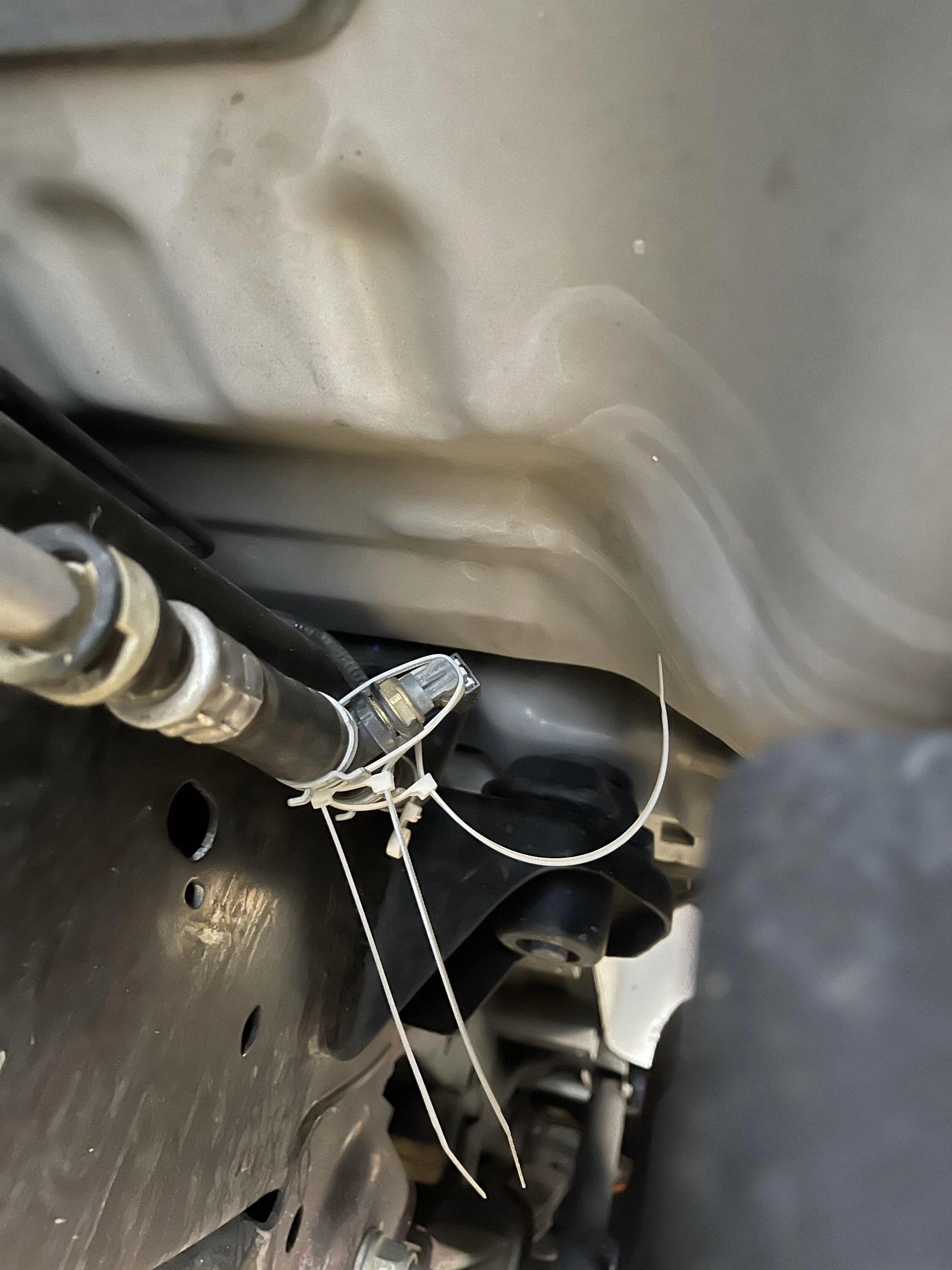 Ford F-150 Broken mount on high-voltage battery coolant line IMG_1887