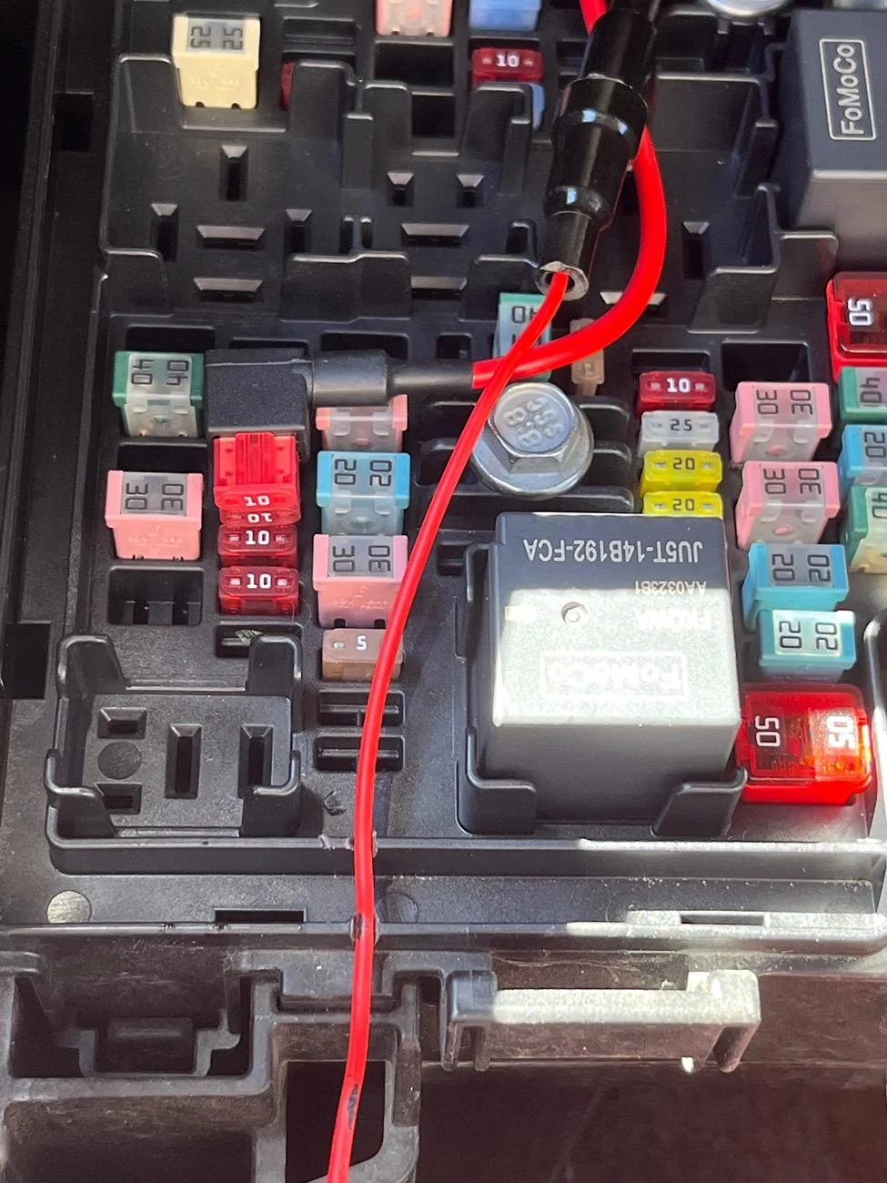 Ford F-150 Picking off driving light power under the hood IMG_2427
