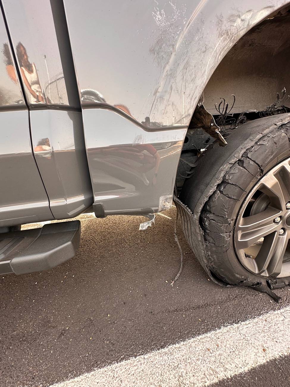 Ford F-150 Tire blew out on a new Platinum Powerboost! IMG_3145