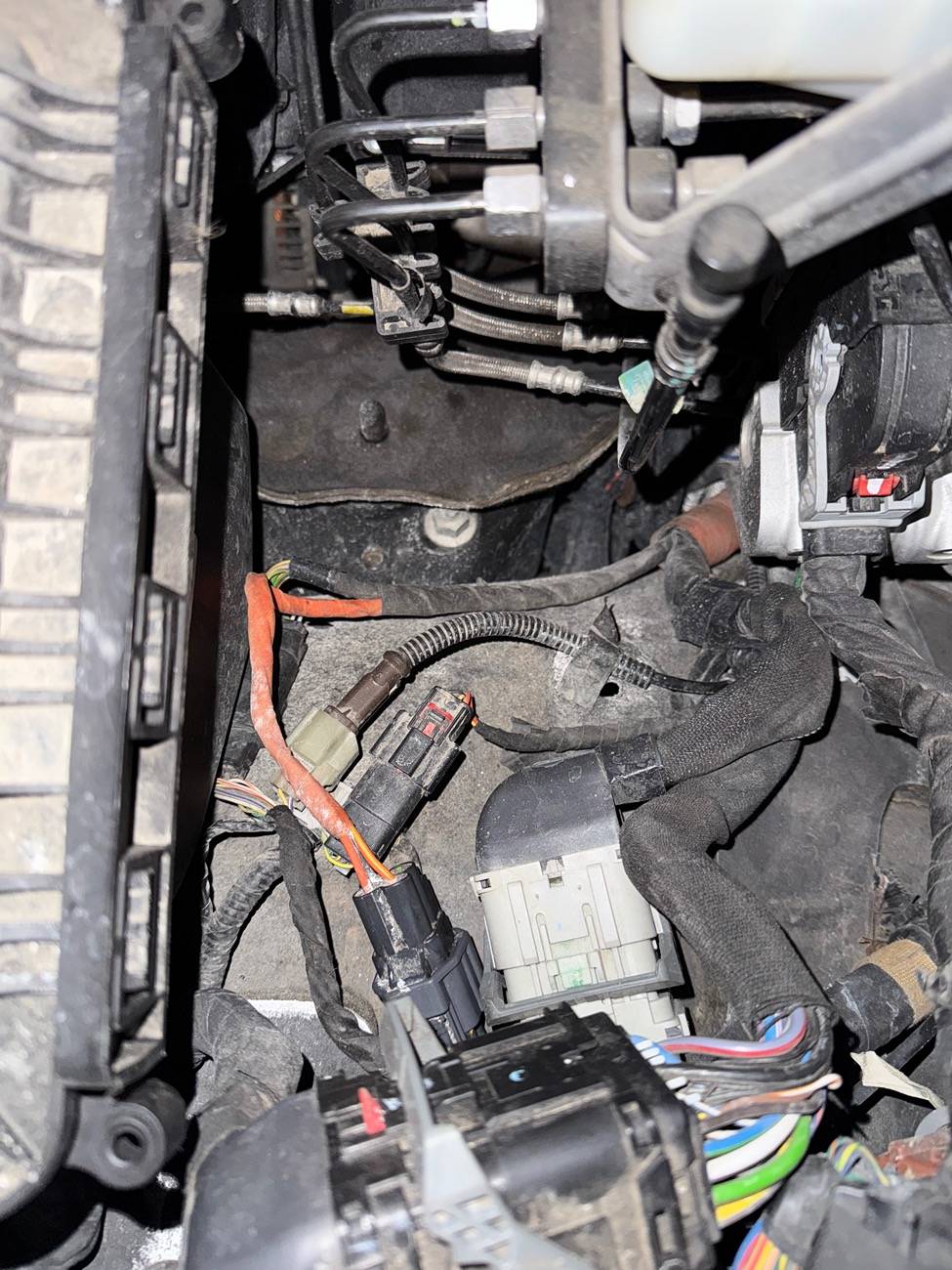 Ford F-150 Wire hanging from wheel well IMG_3210