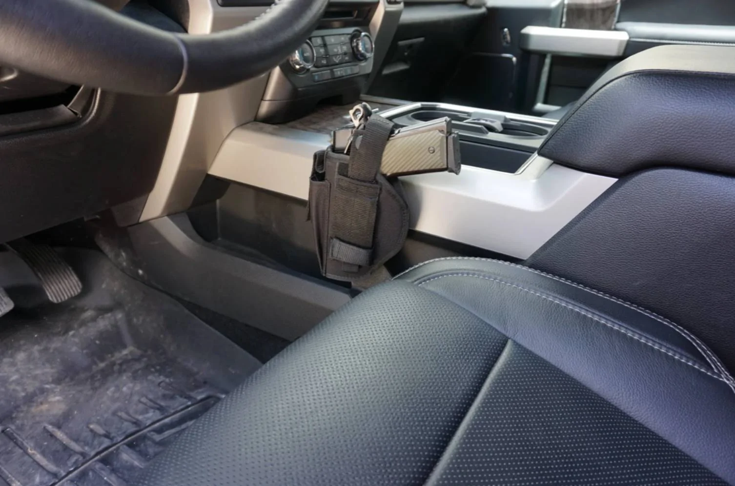 Ford F-150 Gun holster on side of center console IMG_3519