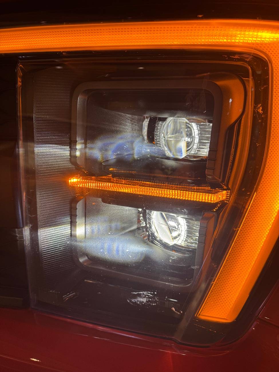 Ford F-150 Any idea what these white marks on my headlights are? IMG_4166