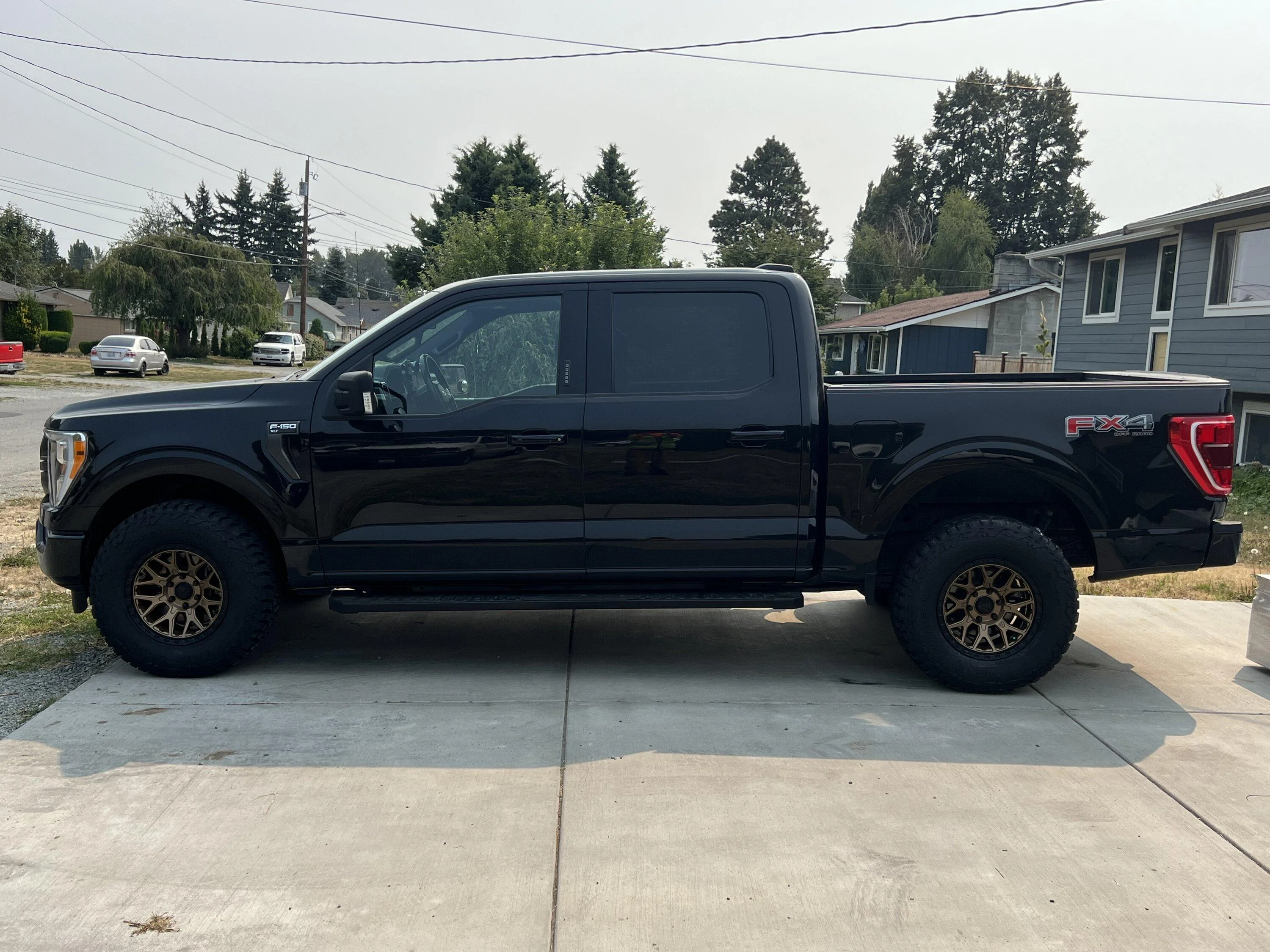 Ford F-150 Alphaequipt 17x8.5 Bronze Halo rims with P285/70r17 Baja Boss AT's img_6964-jpeg