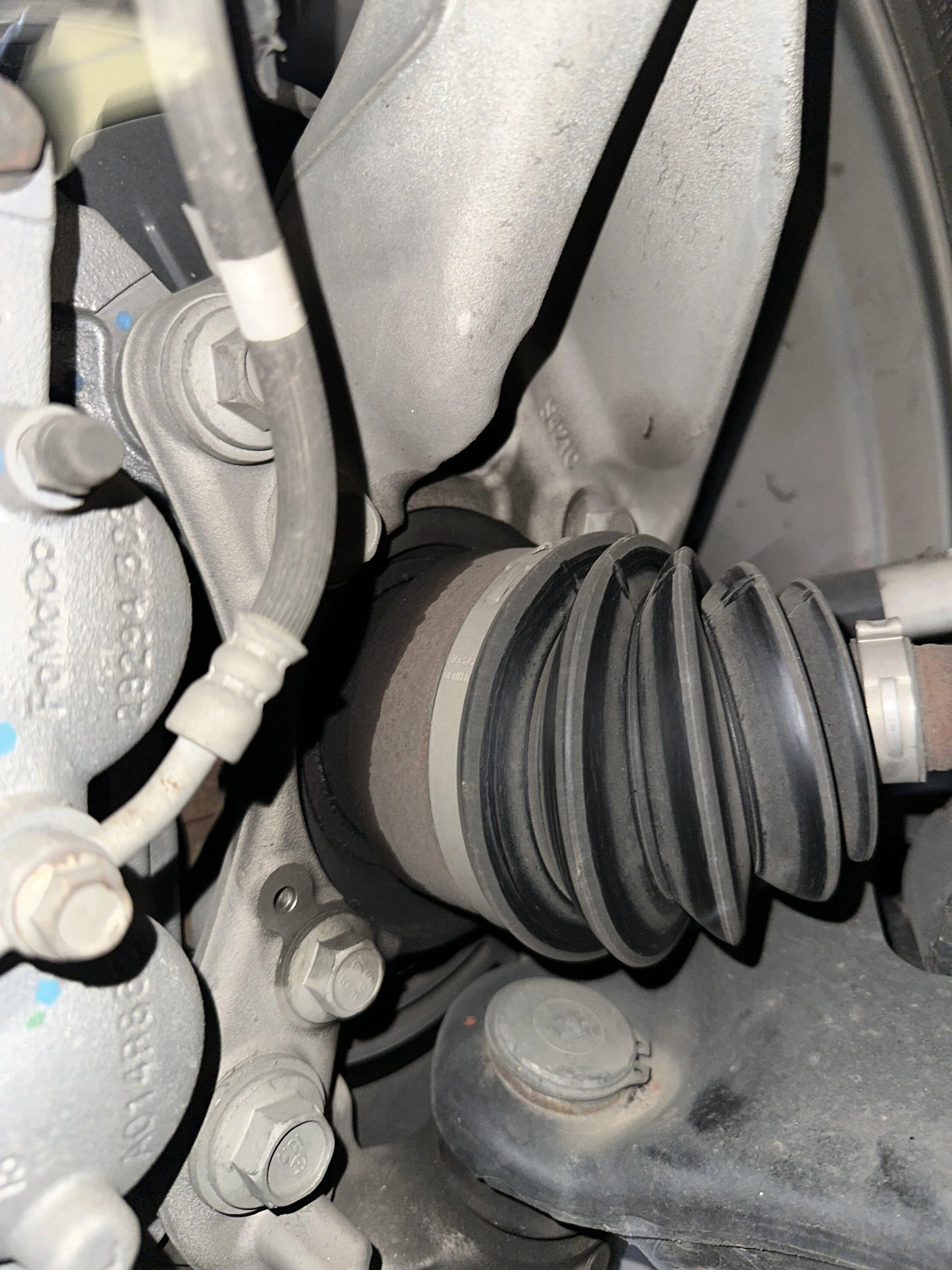 Ford F-150 CV axle oil/wet looking spot on the hub (photo attached) IMG_7077