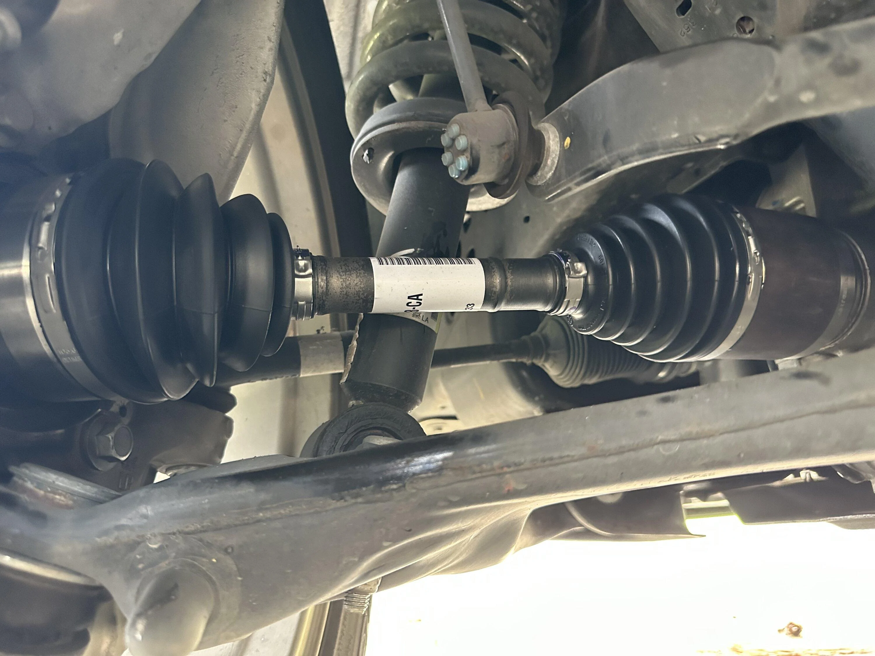 Ford F-150 CV axle oil/wet looking spot on the hub (photo attached) IMG_7394