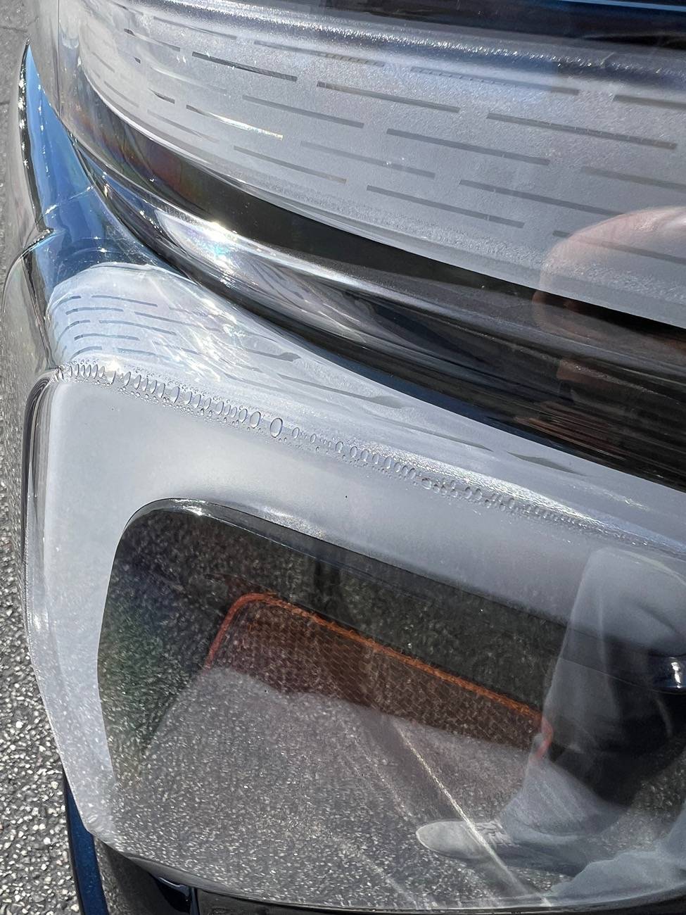 Ford F-150 2024 Lariat water in headlights IMG_7688