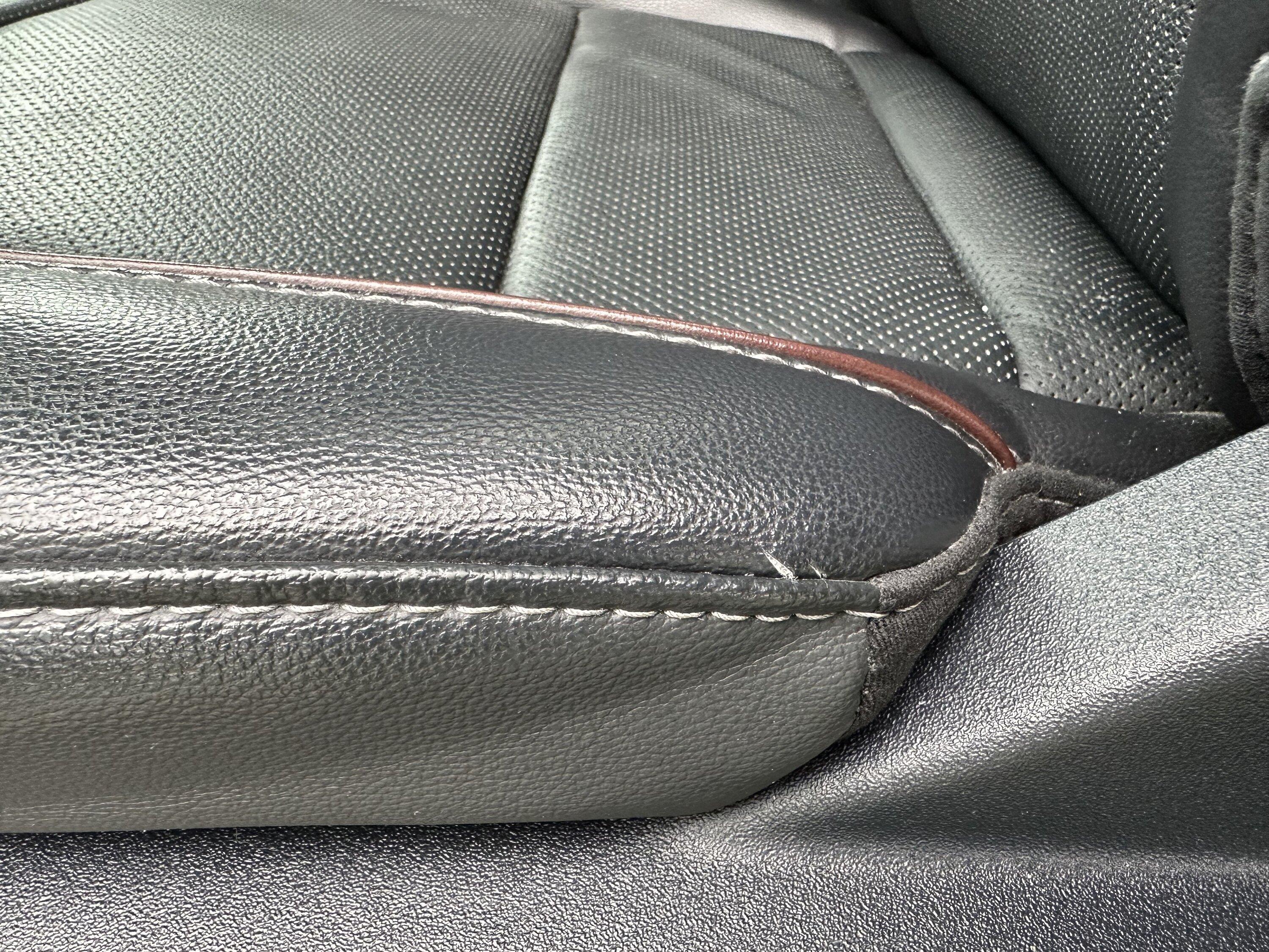 Ford F-150 Drivers seat leather tearing at stitching. Seat