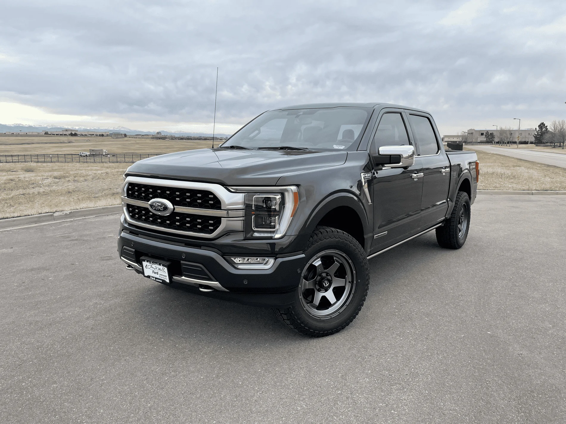 Ford F-150 My Smoked Quartz Platinum Powerboost w/ leveling kit, wheels, bigger tires (295/60-R20), tint, new decal, ceramic coat, stubby antenna tempImageM423XI