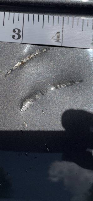 Ford F-150 Gash on roof-Need input on paint touch-up View recent photos