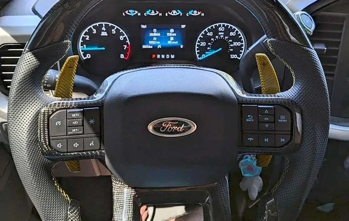 Custom steering wheel and kick panel guards installed