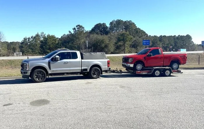 In case your wondering if an F-150 fits on a U-Haul trailer